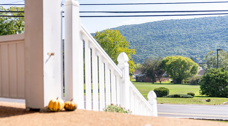 Front porch view of a mountain