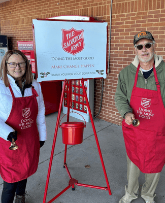 two people volunteering at the salvation army