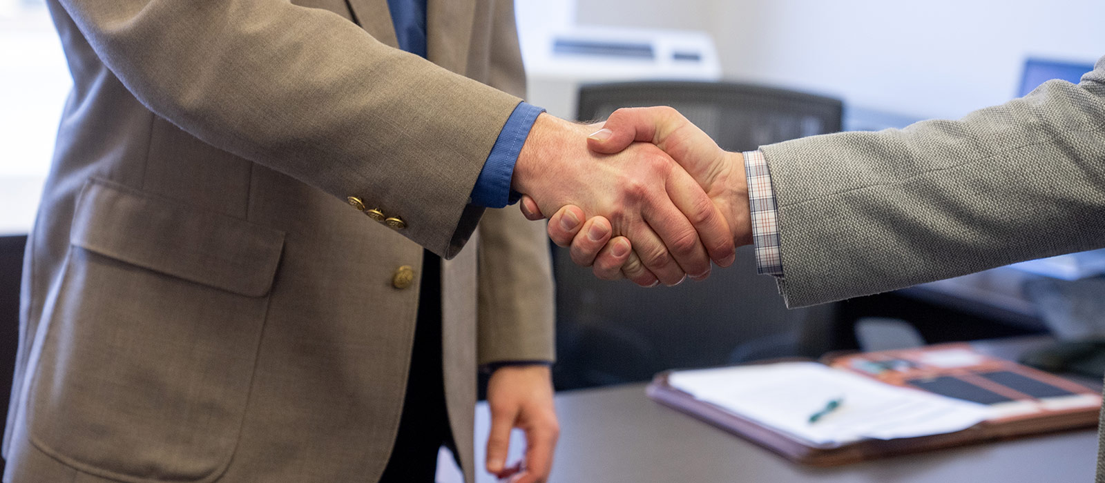 men shaking hands