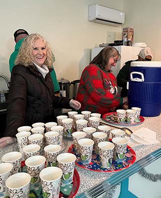 Two people serving hot chocolate