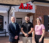 Group outside of barbershop