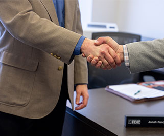 men shaking hands